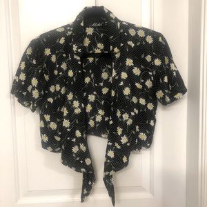 Motel brand tie front blouse. Black with white daisies. Size M.